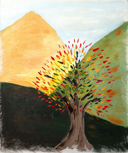 Mountains in the middle of fall create the background for a tree depicting all the stages of fall's changes