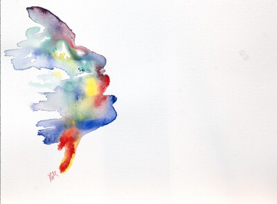 face emerging from watercolor on cotton paper