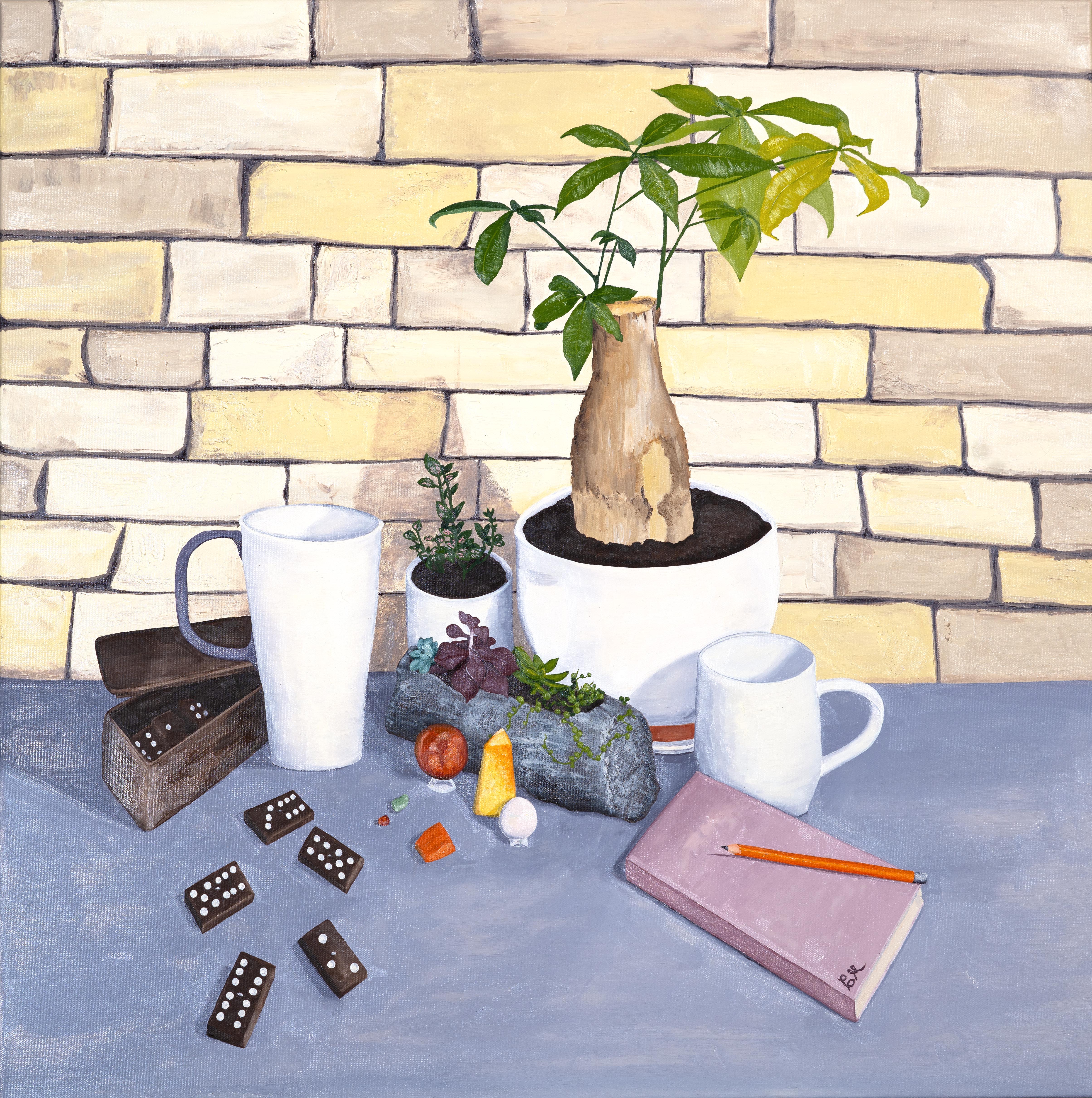 Oil still life depicting potted plants, coffee mugs, dominos, and a notebook